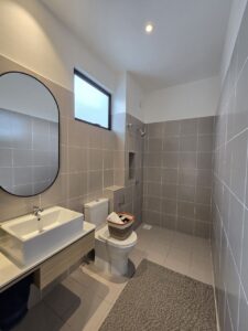 Fully tiled car porch Soren terrace house